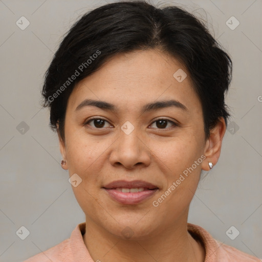 Joyful asian young-adult female with short  brown hair and brown eyes