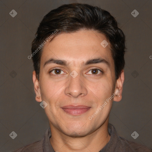 Joyful white adult male with short  brown hair and brown eyes