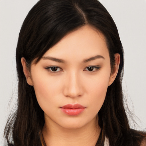 Neutral asian young-adult female with long  brown hair and brown eyes