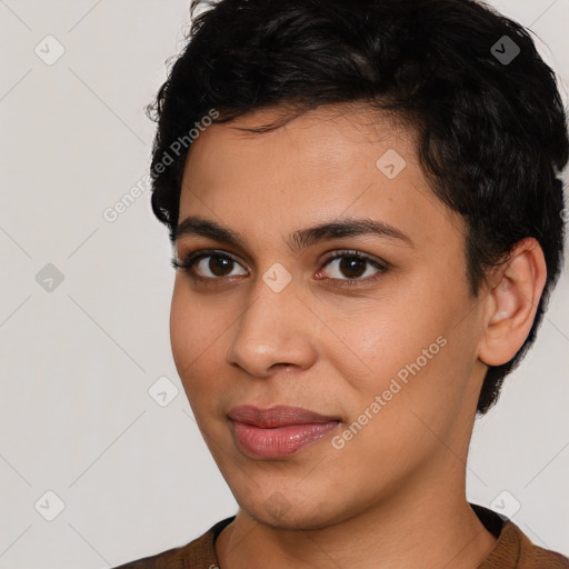 Joyful latino young-adult female with short  brown hair and brown eyes