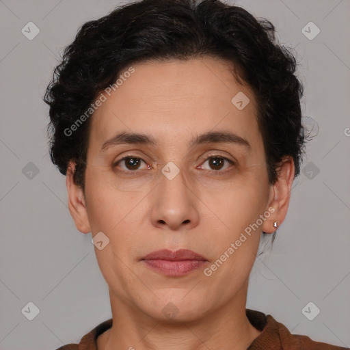 Joyful white adult female with short  brown hair and brown eyes