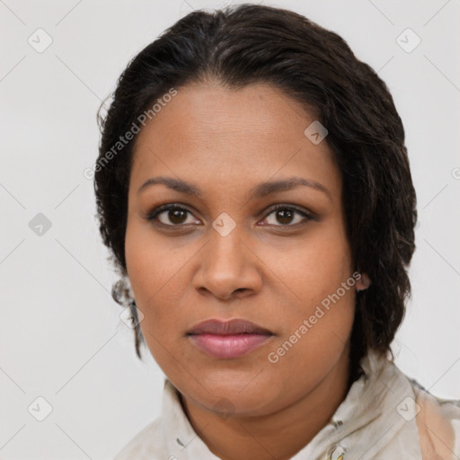Joyful latino young-adult female with medium  brown hair and brown eyes