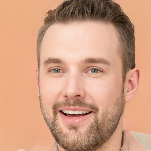 Joyful white young-adult male with short  brown hair and brown eyes