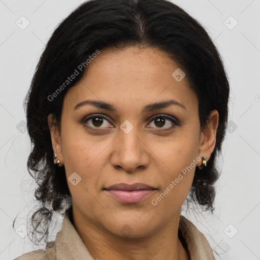 Joyful latino young-adult female with medium  brown hair and brown eyes