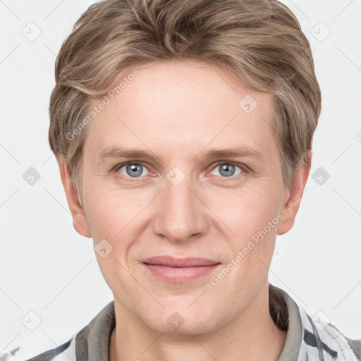 Joyful white adult female with short  brown hair and grey eyes