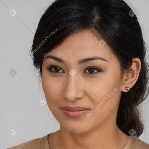 Joyful latino young-adult female with long  brown hair and brown eyes