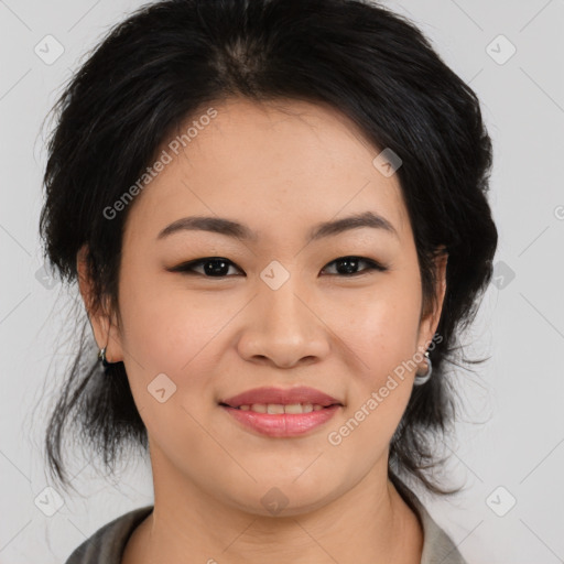 Joyful asian young-adult female with medium  black hair and brown eyes