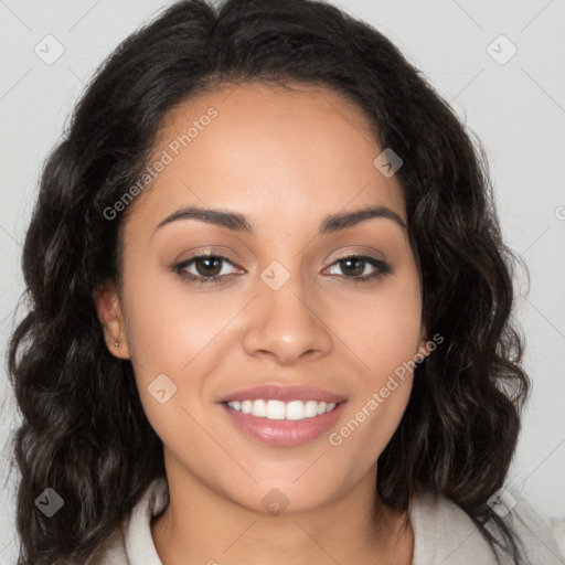 Joyful latino young-adult female with long  brown hair and brown eyes