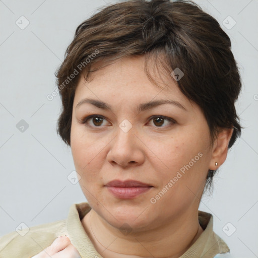 Joyful white adult female with medium  brown hair and brown eyes