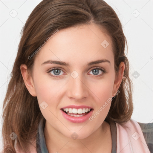 Joyful white young-adult female with long  brown hair and blue eyes