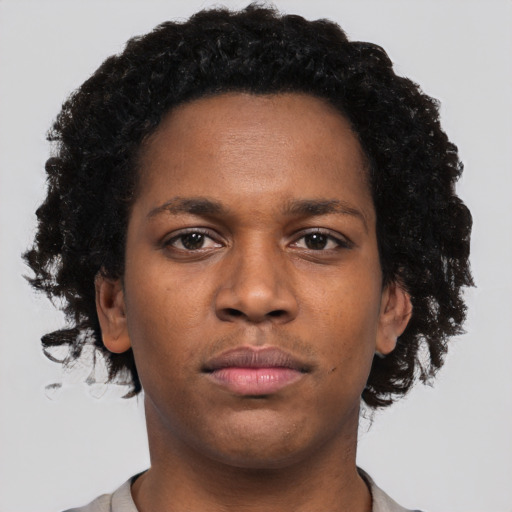Neutral black young-adult female with short  black hair and brown eyes