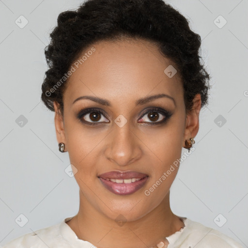 Joyful black young-adult female with short  brown hair and brown eyes