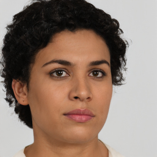 Neutral latino young-adult female with short  brown hair and brown eyes