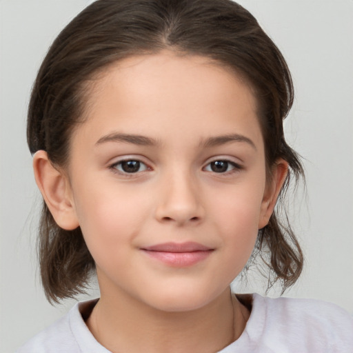 Joyful white child female with medium  brown hair and brown eyes