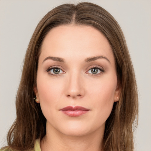 Neutral white young-adult female with medium  brown hair and green eyes