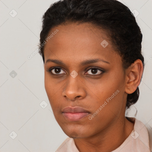 Neutral black young-adult female with short  brown hair and brown eyes