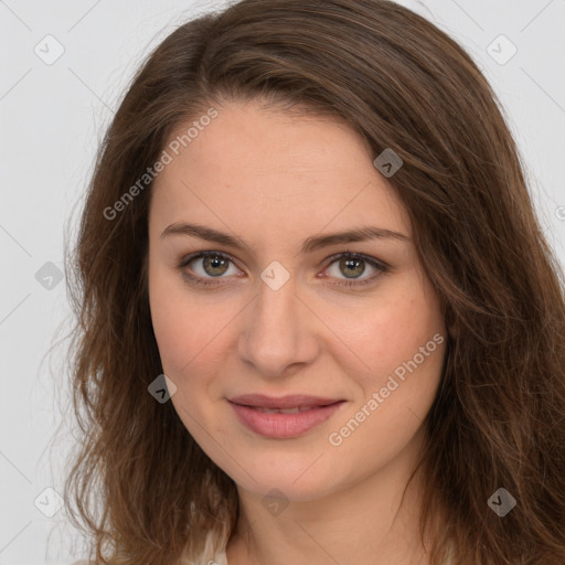 Joyful white young-adult female with long  brown hair and green eyes