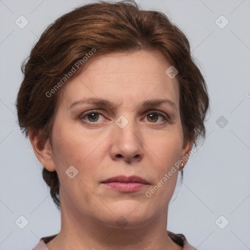 Joyful white adult female with short  brown hair and grey eyes