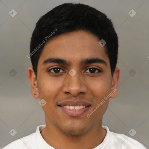 Joyful latino young-adult male with short  black hair and brown eyes