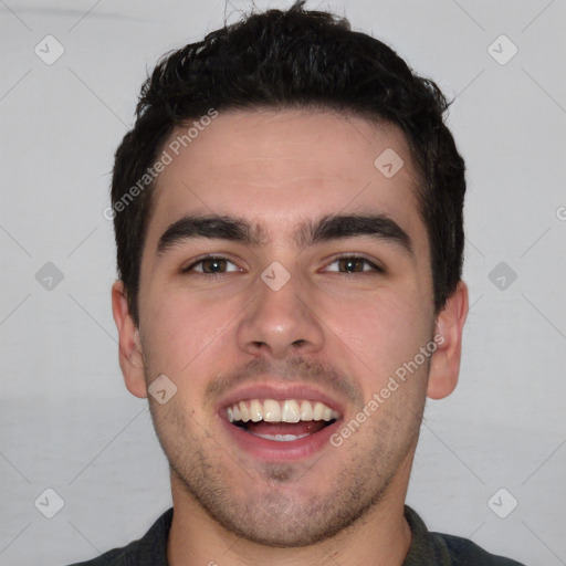 Joyful white young-adult male with short  black hair and brown eyes