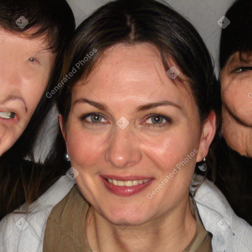 Joyful white adult female with medium  brown hair and blue eyes