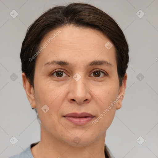 Joyful white adult female with short  brown hair and brown eyes