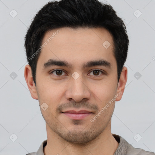 Joyful white young-adult male with short  black hair and brown eyes