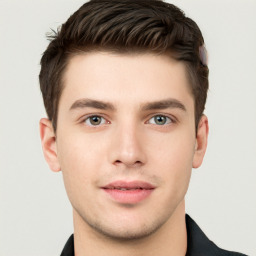 Neutral white young-adult male with short  brown hair and grey eyes
