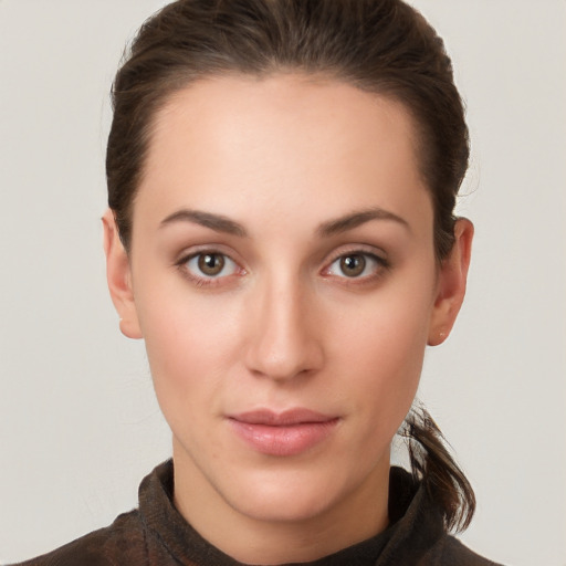 Neutral white young-adult female with short  brown hair and brown eyes