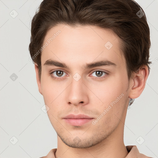 Neutral white young-adult male with short  brown hair and brown eyes