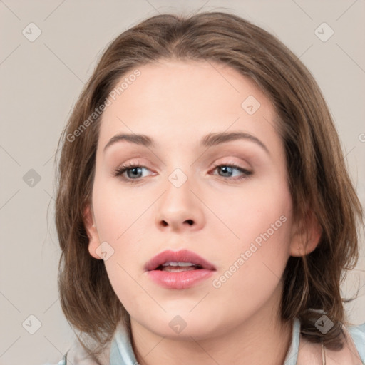 Neutral white young-adult female with medium  brown hair and grey eyes