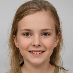 Joyful white child female with medium  brown hair and grey eyes