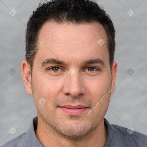 Joyful white adult male with short  brown hair and brown eyes