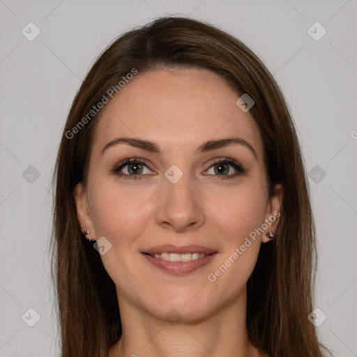 Joyful white young-adult female with long  brown hair and brown eyes