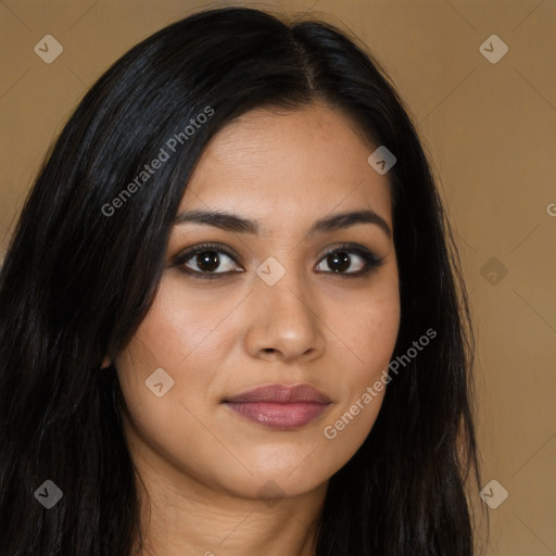 Joyful latino young-adult female with long  brown hair and brown eyes