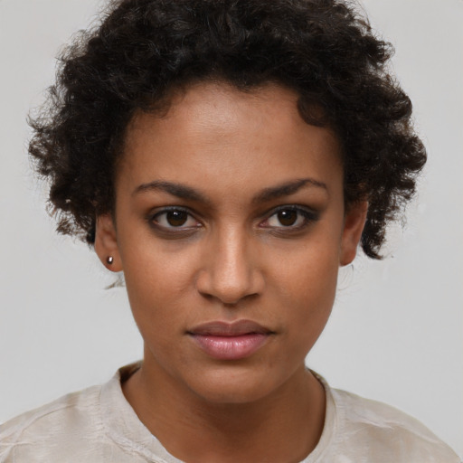 Neutral black young-adult female with short  brown hair and brown eyes