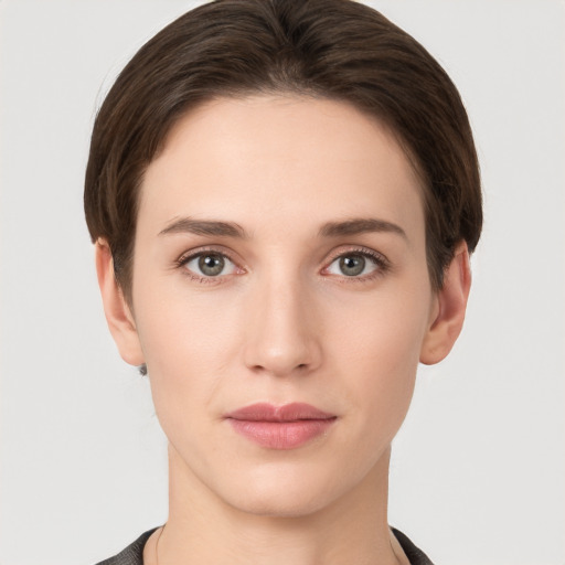 Neutral white young-adult female with short  brown hair and brown eyes