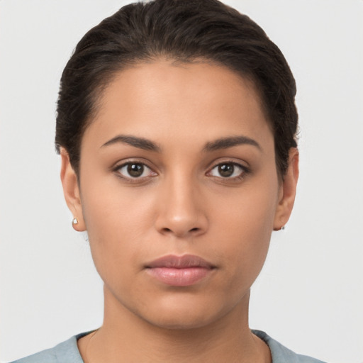 Neutral white young-adult female with short  brown hair and brown eyes