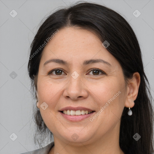 Joyful white adult female with medium  brown hair and brown eyes