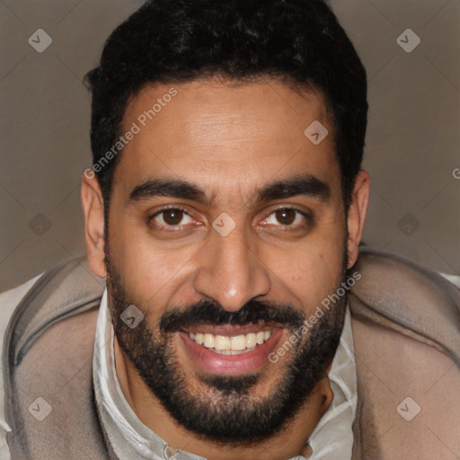 Joyful latino young-adult male with short  black hair and brown eyes