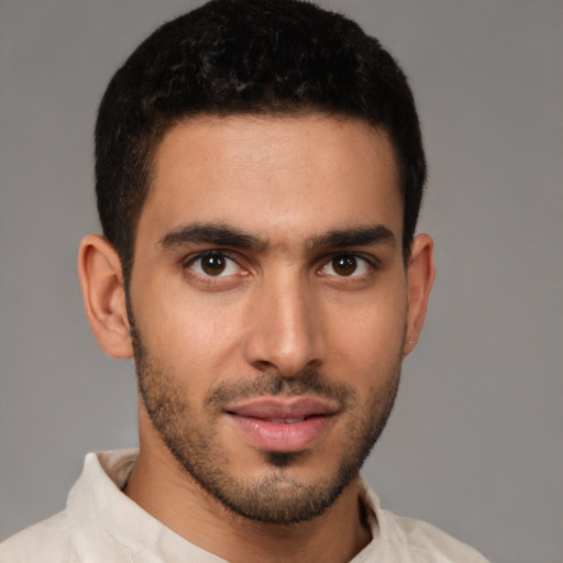 Neutral latino young-adult male with short  brown hair and brown eyes