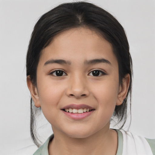 Joyful asian child female with medium  brown hair and brown eyes