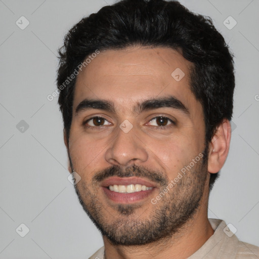 Joyful white young-adult male with short  black hair and brown eyes