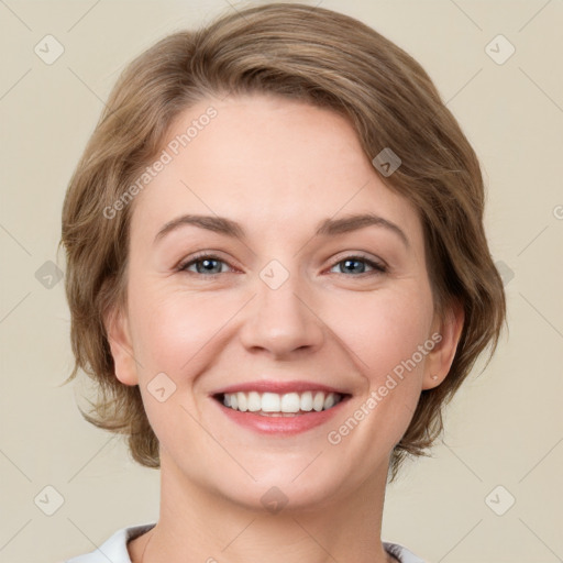 Joyful white young-adult female with medium  brown hair and green eyes