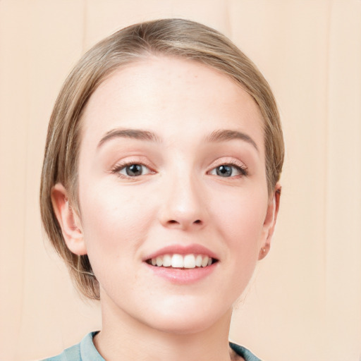 Joyful white young-adult female with medium  brown hair and blue eyes