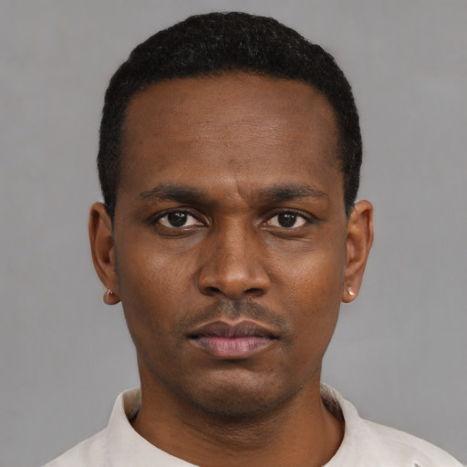 Neutral black young-adult male with short  black hair and brown eyes