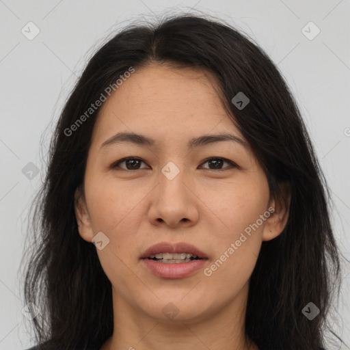 Joyful asian young-adult female with long  brown hair and brown eyes