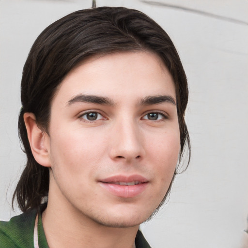 Neutral white young-adult male with medium  brown hair and grey eyes