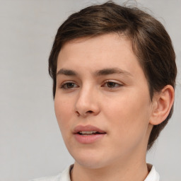 Neutral white young-adult female with short  brown hair and brown eyes