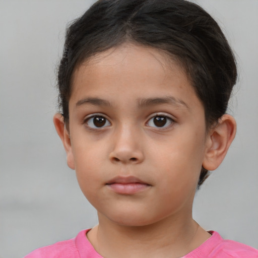 Neutral white child female with short  brown hair and brown eyes